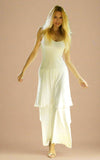 Goddess photographer Kicka wearing Sundari Dress and skirt in off white.
